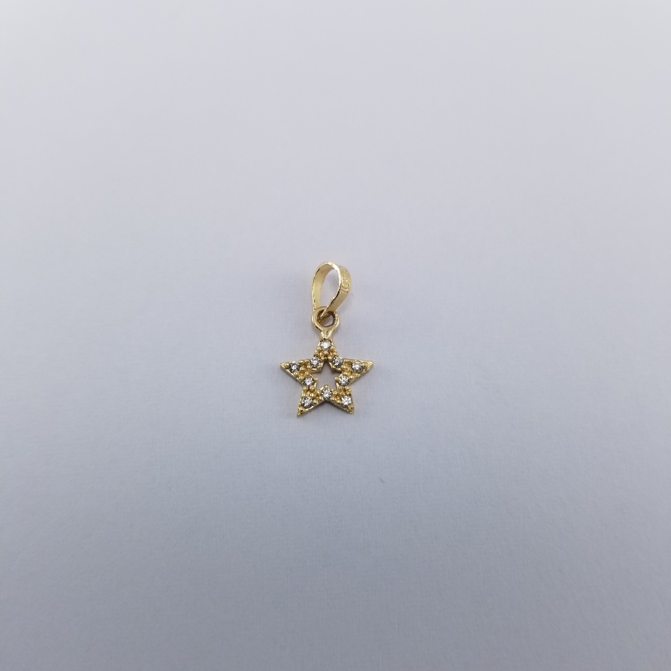 Dije 10k Estrella Contorno Circonias