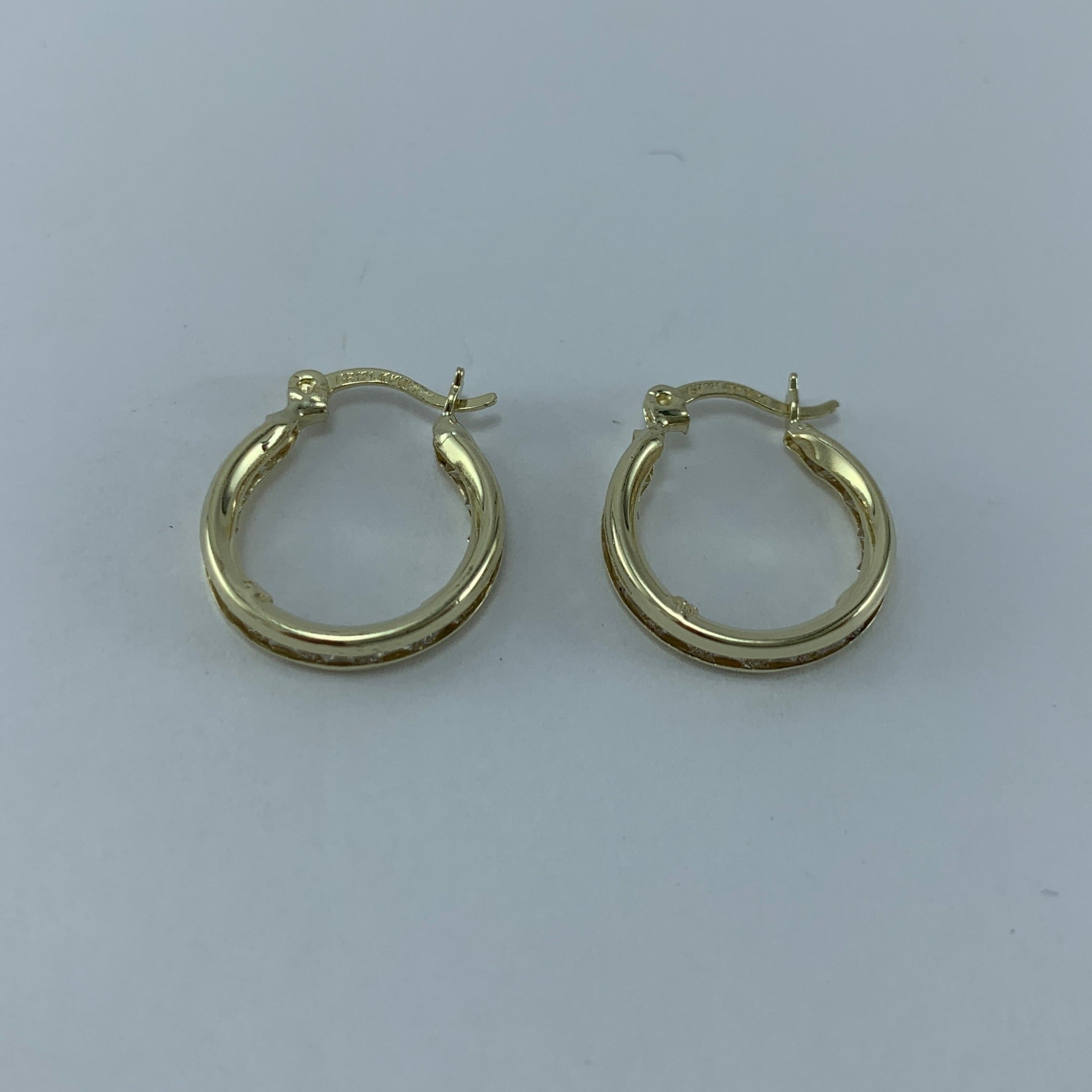 Arracada 10k Circonias biseladas 15x3mm