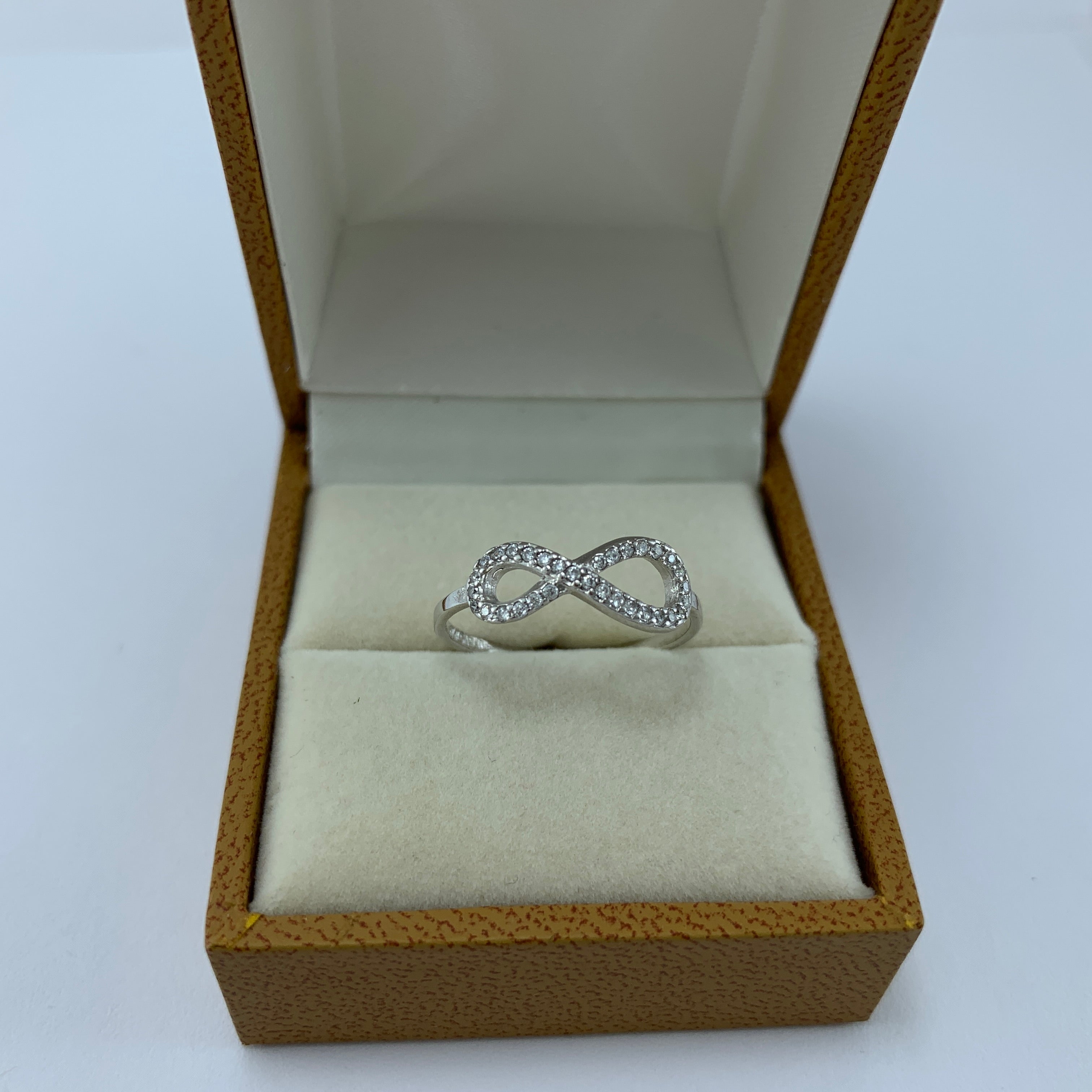 Anillo 10k Infinito circonias oro blanco