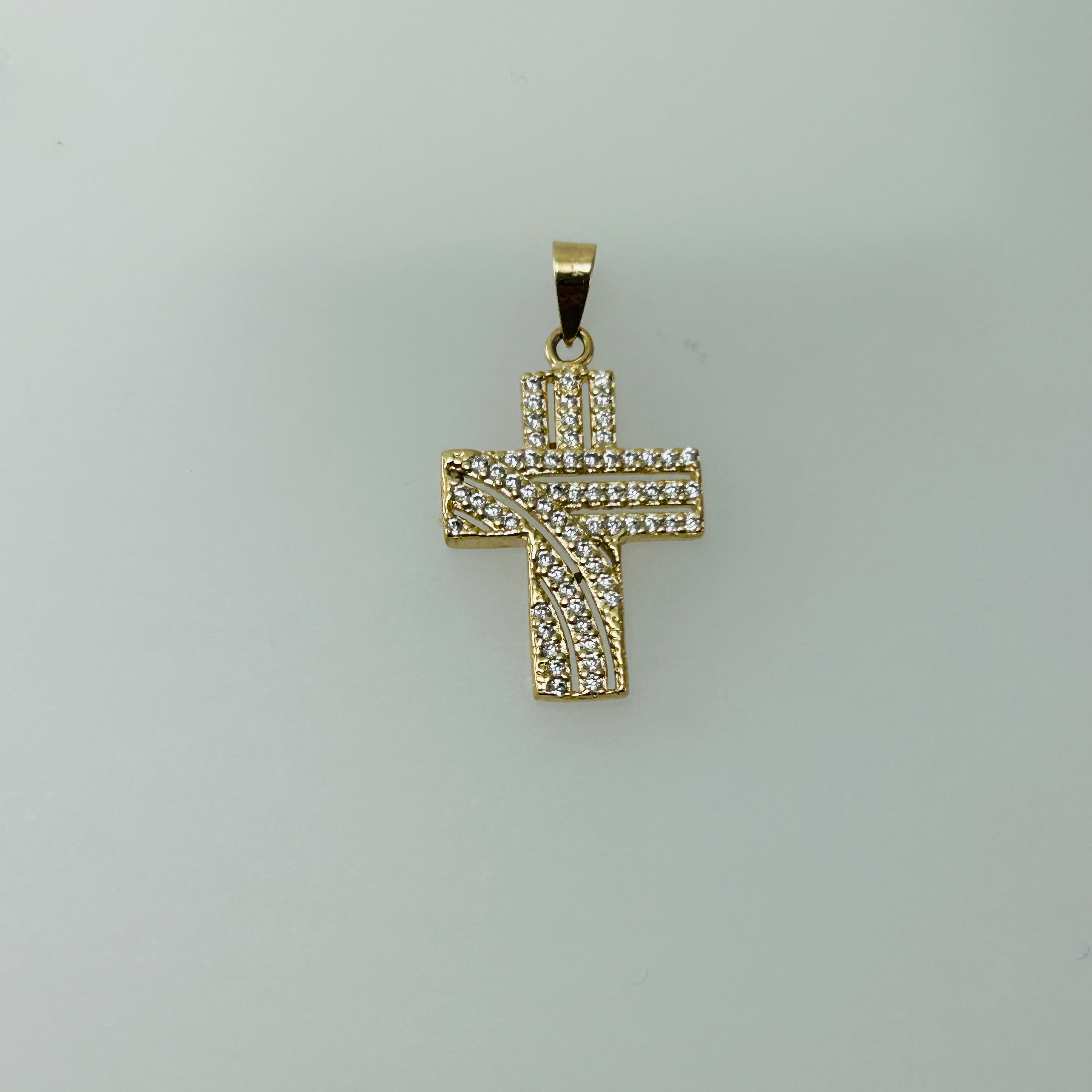 Cruz 10k plana decorada con circonias 19x14mm