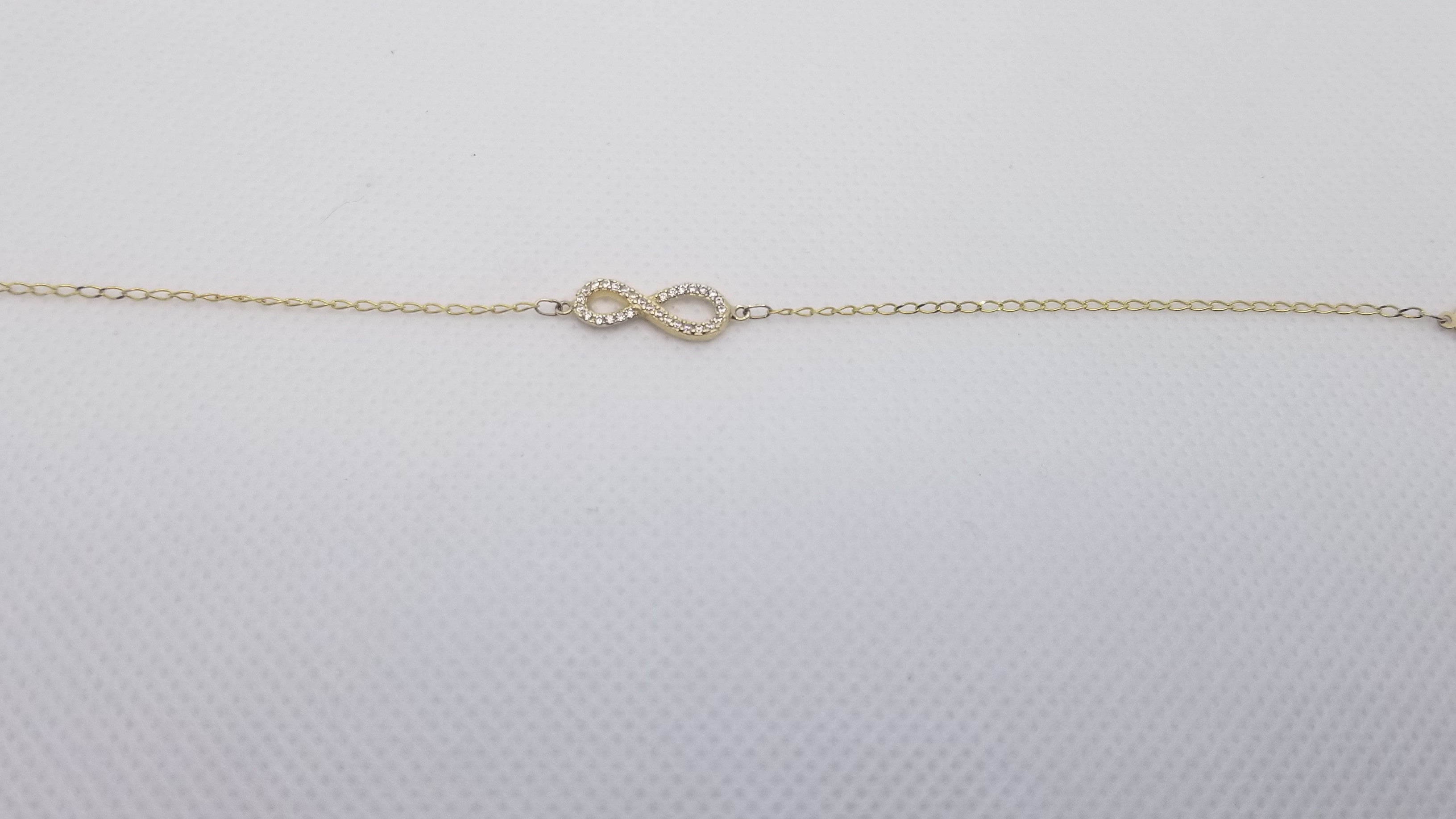 Pulsera 10k Infinito con Circonias