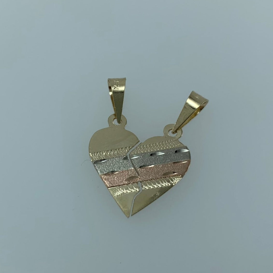 Dije 10k Corazón partido Diamantado lineas