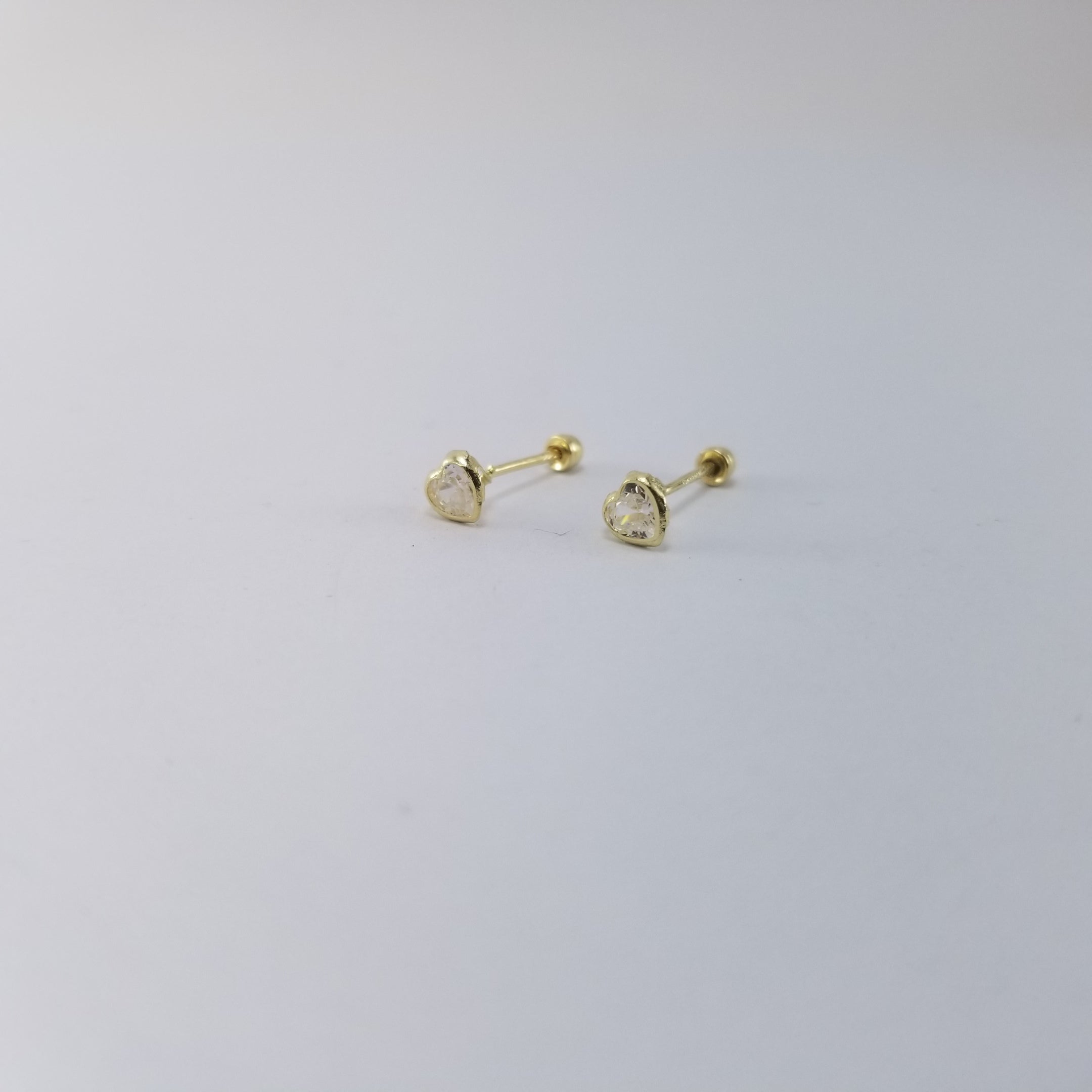 Broquel 14k Corazón Bicelado 4mm