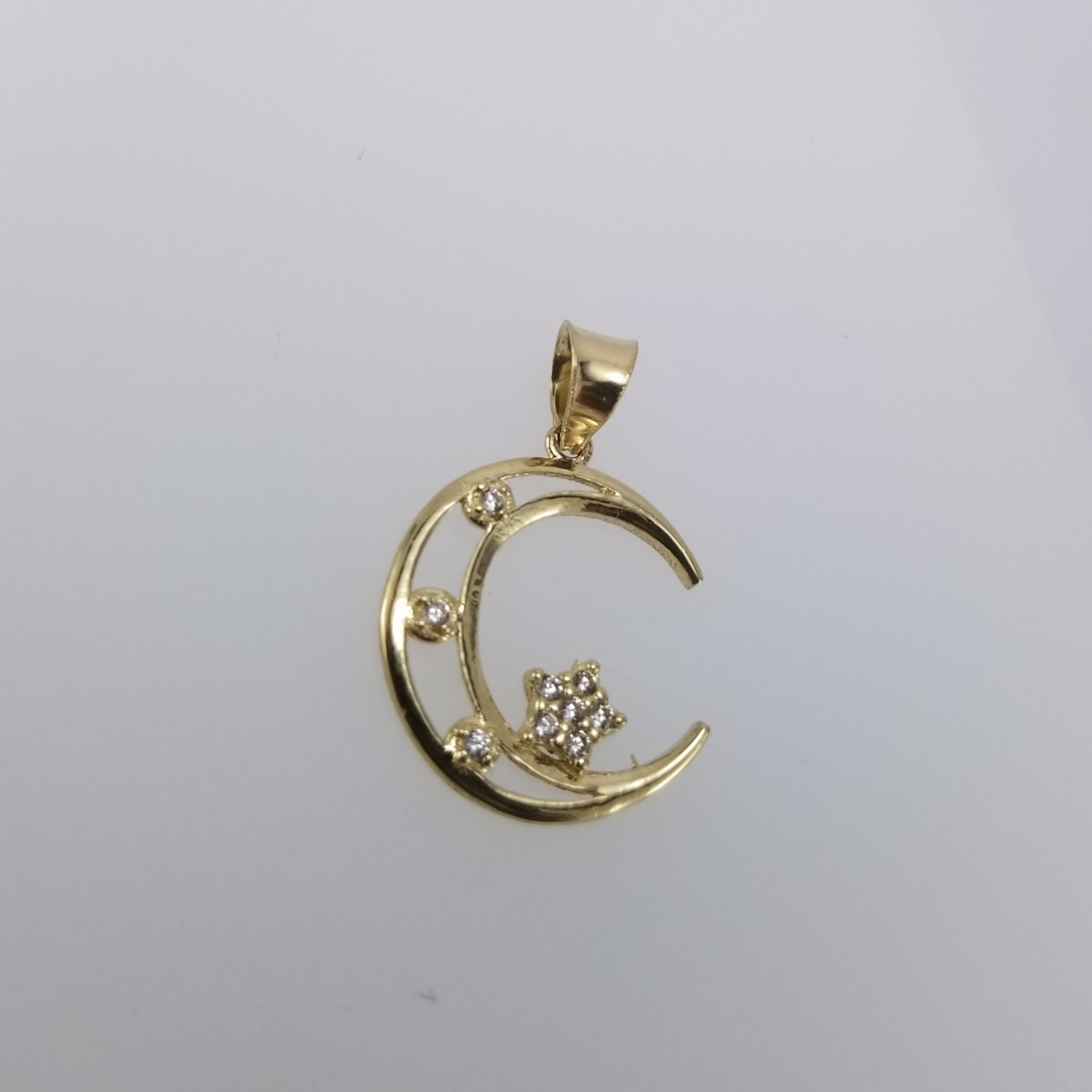 Dije 10k Luna con estrellas